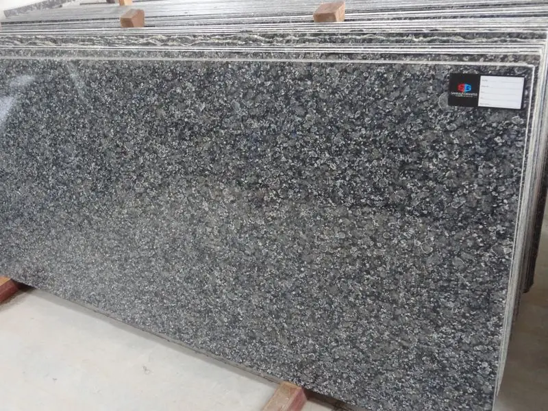 Crystal Blue granite slab on a rack in the Kishangarh yard