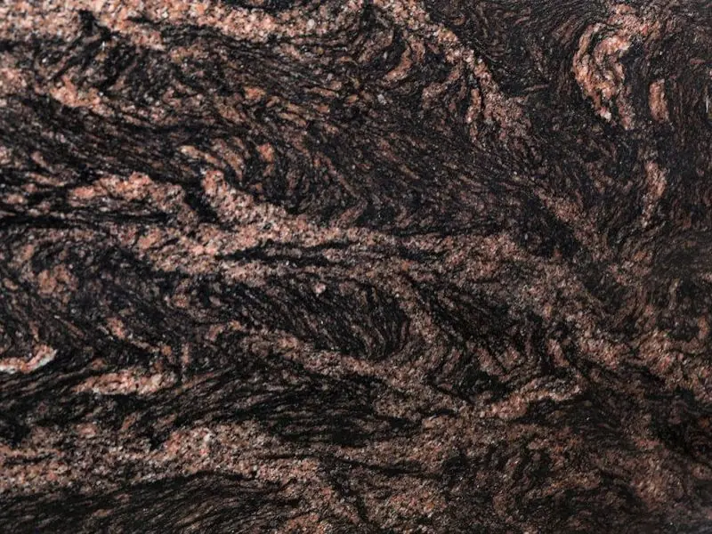 Paradiso granite slab, polished: brown base with dark wave pattern